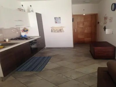 a kitchen with a sink and a counter top at Casa Sara Boavista in Sal Rei