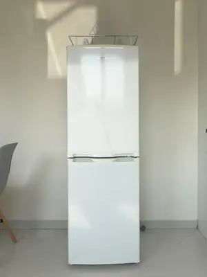 a white refrigerator in a white room at 1 bdr cozy central apt in Praça Center - LCGR in Praia