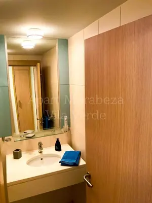a bathroom with a sink and a mirror at Morabeza Vila Verde in Santa Maria