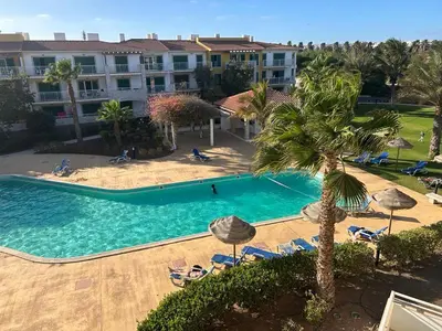 an aerial view of a swimming pool in a resort at Vila Verde Calistemon in Santa Maria