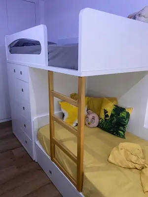 a white bunk bed with a bunk bed underneath it at Apartamento de Luxo -T2 in Praia