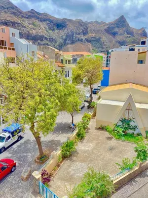 an aerial view of a city with trees and buildings at LAR DO VIAJANTE, Ribeira Grande Santo Antão in Ribeira Grande