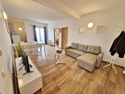a living room with a couch and a table at Holiferias NoStress Sal Island in Santa Maria