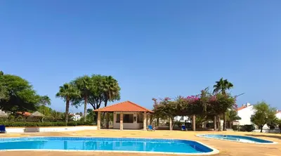 a swimming pool with a gazebo in a yard at BEACH HOUSE - Walkable to Beach - Wi-Fi Included in Santa Maria