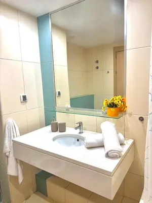 a bathroom with a sink and a mirror at BEACH HOUSE - Walkable to Beach - Wi-Fi Included in Santa Maria