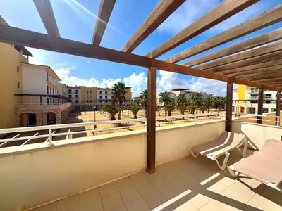 a balcony with a view of a city at BEACH HOUSE - Walkable to Beach - Wi-Fi Included in Santa Maria