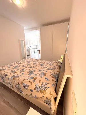 a small bedroom with a bed in a room at Wave Studio in Sal Rei