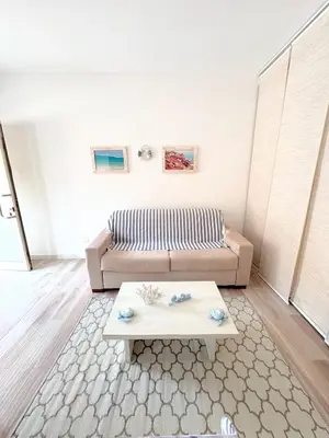 a living room with a couch and a coffee table at Wave Studio in Sal Rei