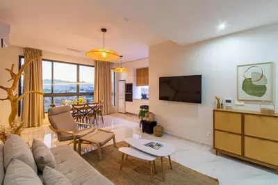 a living room with a couch and a table at HouseLux JJL in Mindelo