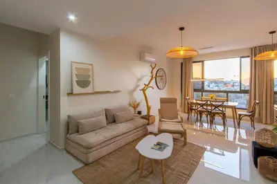 a living room with a couch and a table at HouseLux JJL in Mindelo