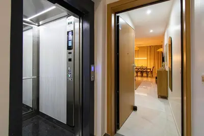 a hallway with a door leading to a dining room at HouseLux JJL in Mindelo