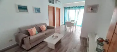 a living room with a couch and a coffee table at Onda do Mar in Sal Rei