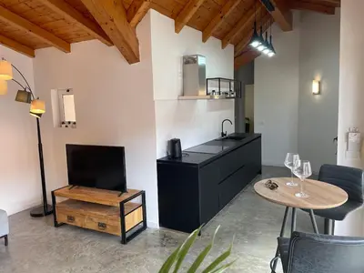 a kitchen with a counter and a table and a table sidx sidx sidx at Island Retreat in Santa Maria