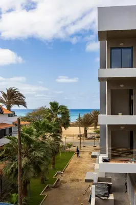 a building with a view of the beach at Ocean View Luxury in Santa Maria