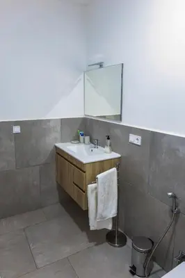 a bathroom with a sink and a mirror at Ocean View Luxury in Santa Maria