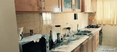 a kitchen with two sinks and a counter top at NoS Casa in Montanha