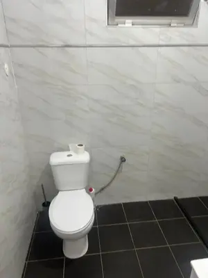 a bathroom with a white toilet in a room at Casa Ida 2 Tarrafal, Santiago, Cape verde in Tarrafal