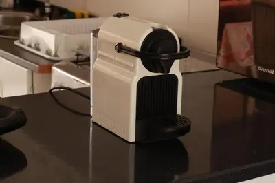 a white and black router sitting on a table at Casa Ida 2 Tarrafal, Santiago, Cape verde in Tarrafal