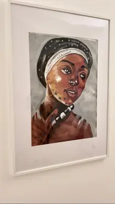 a painting of a woman wearing a headdress at Beautiful Penthouse in Sal Rei