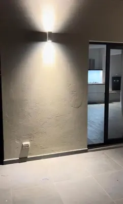 a room with a wall with a light on it at Beautiful Penthouse in Sal Rei