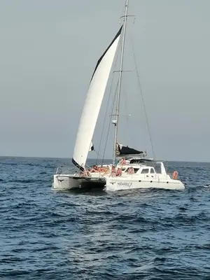 a boat with people on it in the water at Aaparthotel Book a Taxi Group in Prainha