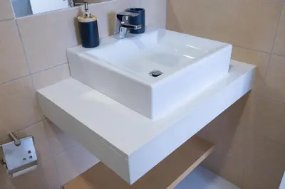 a white sink in a bathroom with a mirror at Helena - Marel Bliss Apartments T3 in Mindelo