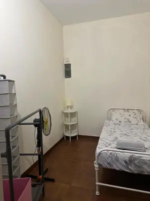a small room with a bed in a room at Casa azul in Mindelo