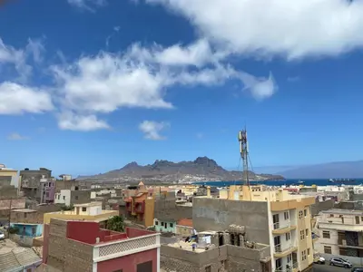 a view of a city with mountains in the background at Casa azul in Mindelo