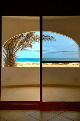 a window with a view of the beach at Alma MIRIAM in Sal Rei