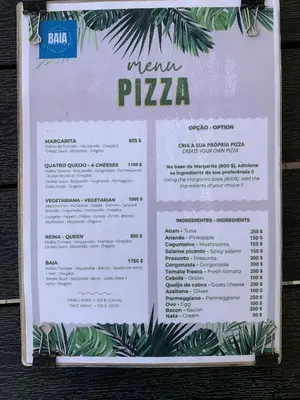 a menu for a pizza restaurant on a wall at Apartament Salim in Beirona