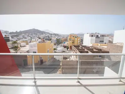 a view of a city from a balcony at Apartamentos Octane Mindelo in Mindelo
