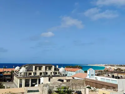 a view of a city with the ocean in the background at Albis Harena - In Sal in Santa Maria