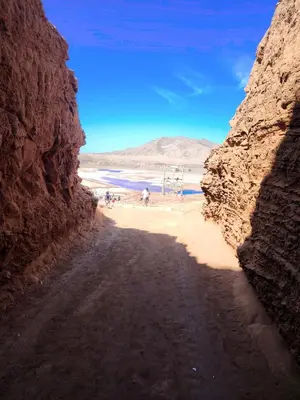 a dirt road in the desert with a view of a body of water at Casa Guido T3, 3 Bedroom in Santa Maria