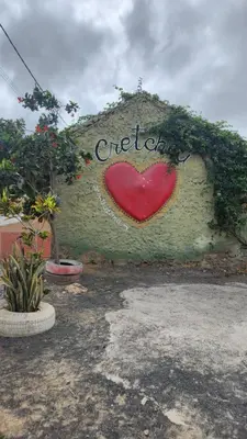 a wall with a red heart painted on it at Casa Guido T3, 3 Bedroom in Santa Maria