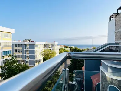 a balcony with a view of the ocean at Douceur de Vie in Praia