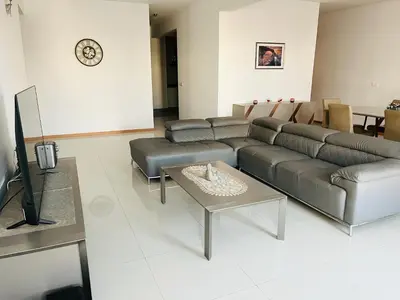a living room with a couch and a table at Douceur de Vie in Praia