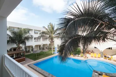a view of the pool from the balcony of a hotel at Ouril Pontao Hotel in Santa Maria
