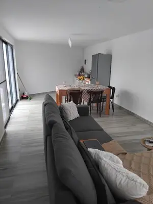 a living room with a couch and a table at Quinta Achada Fazenda in São Tiago