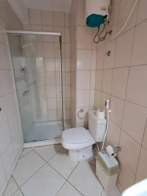 a bathroom with a toilet and a shower at Boa Vista BriMar Holidays, apartamento with pool in Rabil