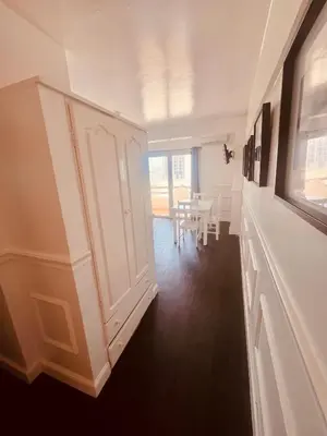a room with a door and a dining room at Casa Relaxa in Sal Rei