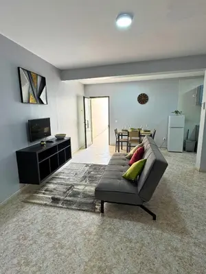a living room with a couch and a table at Doce de Sal in Santa Maria