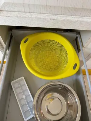 a yellow frisbee sitting on top of a shelf at Murdeira V31 G by RPG Group in Beirona