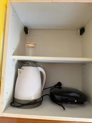 a tea kettle and a toaster in a drawer at Murdeira V 31 H by RPG Group in Beirona
