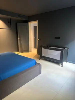 a bedroom with a bed and a glass table at Boa Vista Apartment in Prainha