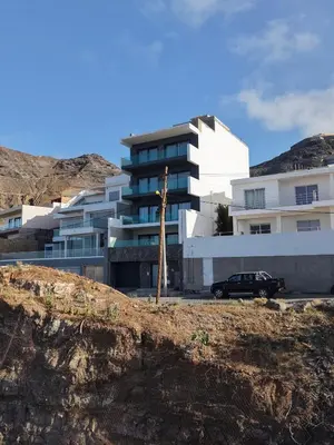 a car parked in front of a building at Boa Vista Apartment in Prainha