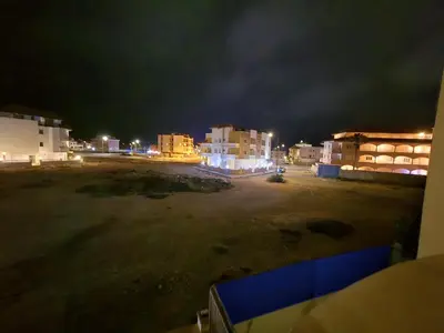 a view of a parking lot at night at T0 Bounty in Santa Maria