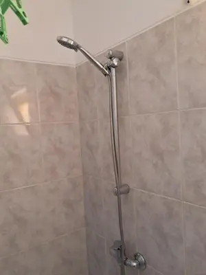 a shower with a glass door in a bathroom at Vivenda Mia in Beirona
