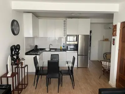 a kitchen with a table and chairs in a room at Holiday Sal Island in Santa Maria