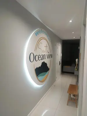 a welcome sign on a wall in a hallway at Santa Ocean View in Mindelo