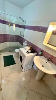 a bathroom with a shower and a toilet and a sink at Estrella Do Mar Santa Maria in Santa Maria